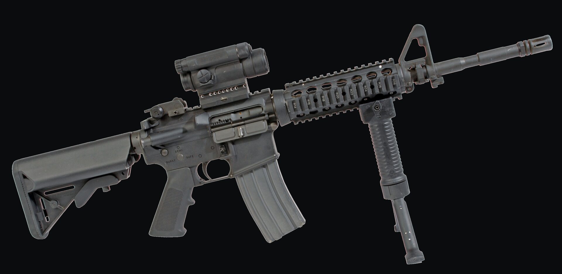 Colt M4 pattern carbine with red dot sight, foregrip and bipod